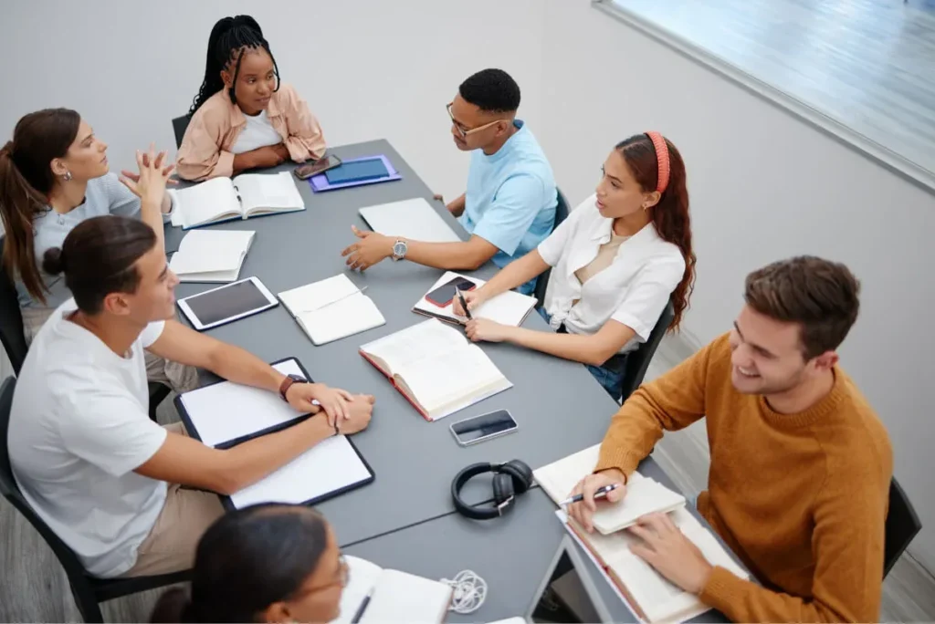 Dynamic brainstorming session among professionals, symbolizing the Best Marketing Firms in US, fostering creativity, strategy, and innovation in the industry.